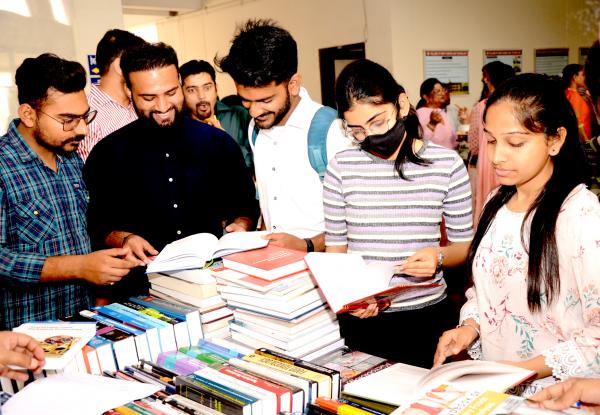 Students in the 9th Book Exhibition organized by the GADVASU on Dated 16-03-2022